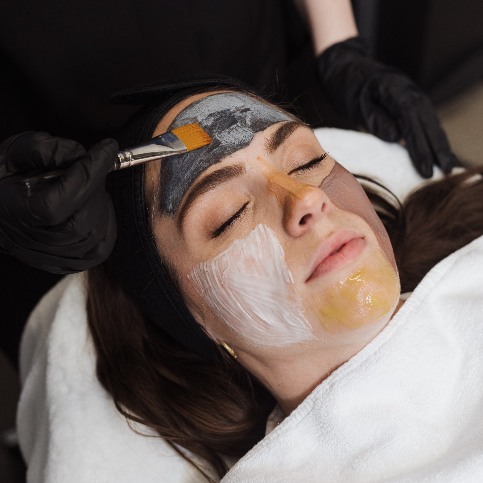 A PCA Skin professional mask being applied during a facial